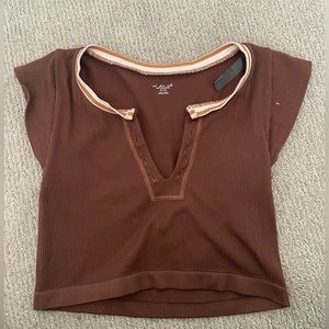 Out from under urban crop top